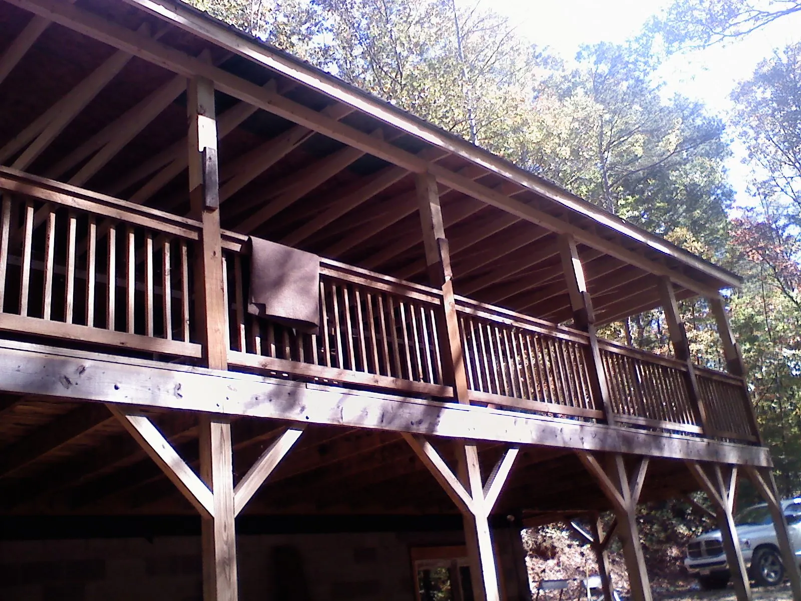 Timber framing under a new elevated porch and deck — Roof Leak Repair in Balch Springs by Roofing Brothers